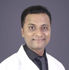 Dr Gautham S L